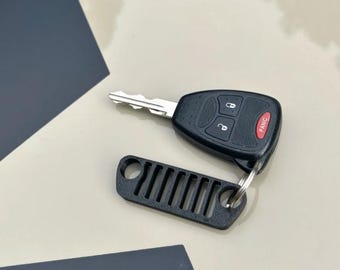 Nyckelring – Plastgrilldesign för Jeep