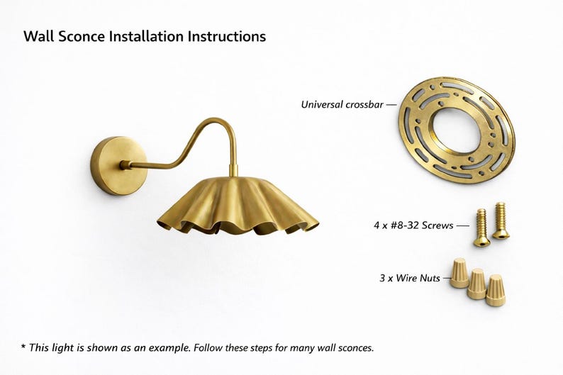 Pair of vintage brass wall sconces with downward, ruffled shades and curved arms, antique brass finish.