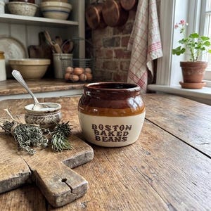 Jack Smillie Woburn , Ma Bean Pot. Three Tone Boston Baked Bean Jar. Measures 2.75x3.75.