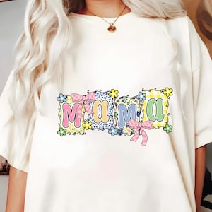 May include: A set of three ceramic mugs with a speckled, matte finish. The mugs are in shades of cream, light gray, and dark gray. Each mug has a simple, minimalist design, perfect for coffee or tea.