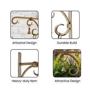 May include: Gold-coloured metal hanging bracket with a decorative scroll design. The bracket features a small bell and the text "Artisanal Design", "Durable Build", "Heavy-duty Item", and "Attractive Design".
