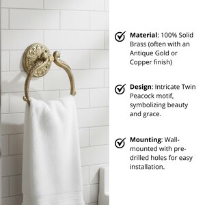 May include: Antique gold-finished brass towel ring with an intricate twin peacock motif. The wall-mounted ring holds a white towel. The design features pre-drilled holes for easy installation. The material is 100% solid brass.