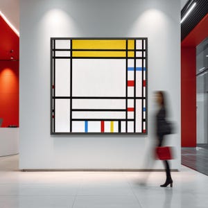 Può includere: Dipinto astratto incorniciato con sfondo bianco, linee a griglia nere e blocchi gialli, rossi e blu. L'opera d'arte è esposta su una parete bianca in un interno moderno.