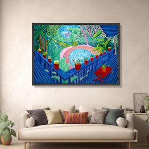 May include: A framed painting depicts a vibrant outdoor scene. A blue deck with red potted plants leads to a pool area with a pink arch. A red table with a cactus sits on the deck. Lush greenery and trees fill the background.