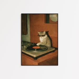 May include: A framed print featuring a cat wearing sunglasses, operating a record player. The cat is light brown with dark stripes. The record player is silver with a black record. The background is a warm, reddish-brown color.