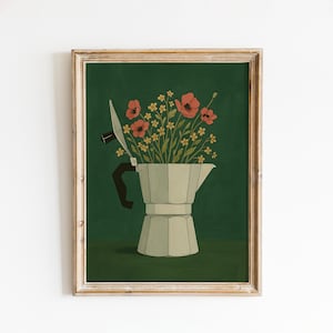 May include: A framed art print featuring a still life of a silver stovetop espresso maker filled with red poppies and yellow flowers against a dark green background. The frame is a light wood color.