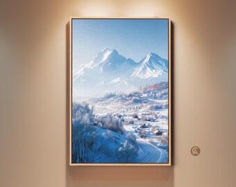 May include: A framed art print of a winter landscape featuring snow-capped mountains and a village. The artwork shows a clear blue sky above the mountains, with a valley below filled with snow-covered trees and a road. The color scheme is mainly white, blue, and orange.