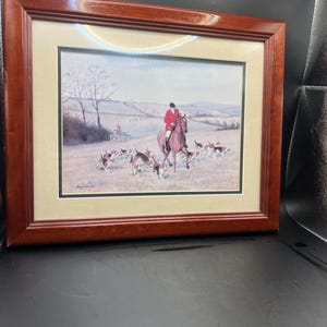 May include: A set of three ceramic mugs with a speckled, matte finish. The mugs are in shades of cream, light gray, and dark gray. Each mug has a simple, minimalist design and a rounded handle. The mugs are stacked on top of each other.