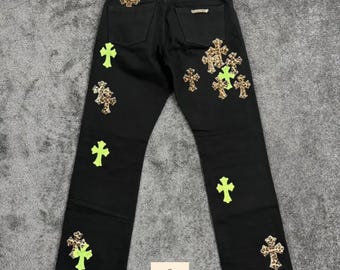 Vaqueros negros con diseño de cruz, estilo urbano, unisex.