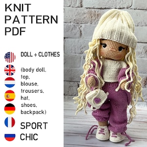 May include: A handmade doll with long blonde hair, wearing a cream-colored knit hat, a white top, and a purple knit tracksuit. The doll has a matching backpack and shoes. The image includes the text "KNIT PATTERN PDF" and "DOLL + CLOTHES".