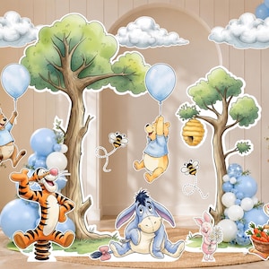 May include: A decorative set of Winnie the Pooh character cutouts including Pooh, Tigger, Eeyore, Piglet, Roo, and Rabbit. The scene features illustrated trees, clouds, bees, a beehive, and a basket of carrots, accented by blue and white balloons.