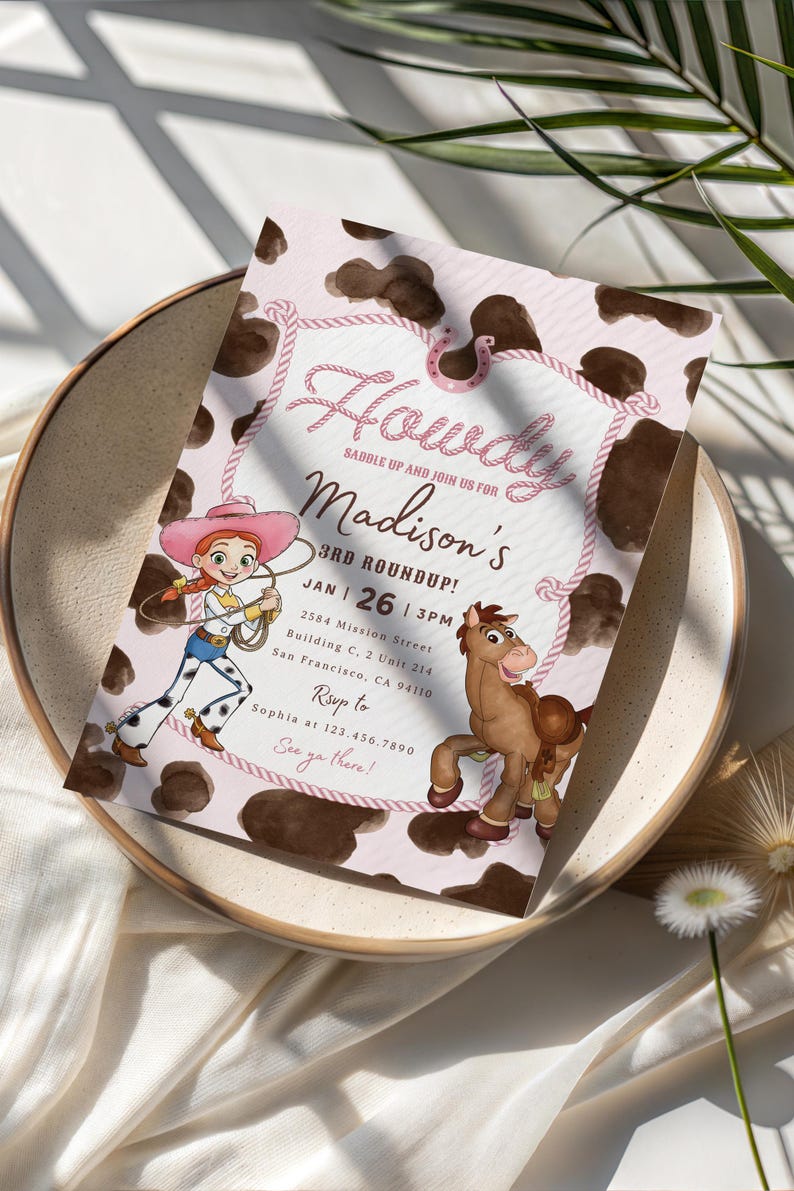 May include: A rectangular party invitation card with a brown and white cow print background. The text reads Howdy, Saddle up and join us for Madison's 3rd Roundup, Jan 26, 3pm, 2584 Mission Street, San Francisco, CA 94110, Rsvp to Sophia at 123.456.7890, See ya there!