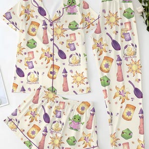 May include: A white ceramic mug with a black handle and the text "But First, Coffee" in a handwritten style. The mug is on a white surface. The mug is 4 inches tall.