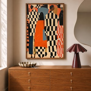 May include: A rectangular framed wall art print featuring a stylized illustration of figures in a crowd. The figures wear garments with bold black and white checkerboard patterns, solid orange coats, and vertical red and white stripes.