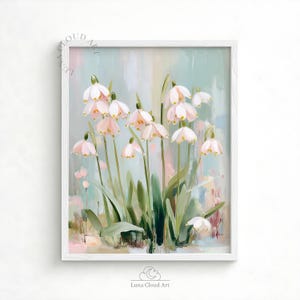 May include: A framed floral art print featuring a cluster of delicate white and pink bell-shaped flowers with green stems and leaves. The artwork has a soft, pastel color palette with a white frame, creating a serene and elegant aesthetic.