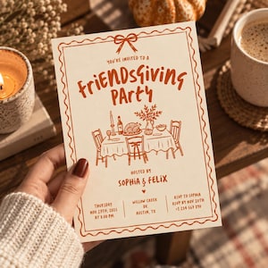 May include: A cream-colored Friendsgiving party invitation card with orange text and illustrations. The card features a bow at the top, a dining table scene, and details including the date, Thursday Nov 27th, 2025, at 8:00 PM, location, and RSVP information for Sophia and Felix.