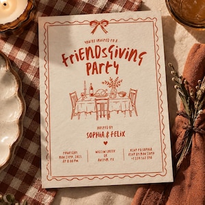 May include: A rectangular off-white Friendsgiving party invitation card with a scalloped red border and a bow at the top. The text reads: You're invited to a Friendsgiving Party, hosted by Sophia & Felix, Thursday Nov 27th, 2025, at 8:00 PM.