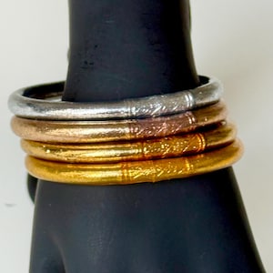 Auténtico brazalete de mantra budista, juego de 4 colores.
