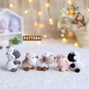 May include: A set of three ceramic mugs with a speckled, matte finish. The mugs are in shades of cream, light gray, and dark gray. Each mug has a simple, modern design and a rounded handle.