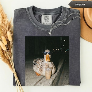 Comfort Colors® Duck Drinking Iced Coffee Shirt, Funny Meme Graphic Tee, Quirky Animal Lover Gift, Trendy Coffee Drinker Tee, Sarcastic Tee