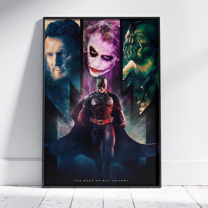 May include: A vertical rectangular poster featuring a central figure of Batman in a black suit, surrounded by portraits of Ra's al Ghul, the Joker, and Bane. The text "THE DARK KNIGHT TRILOGY" is printed in small white letters at the bottom centre.