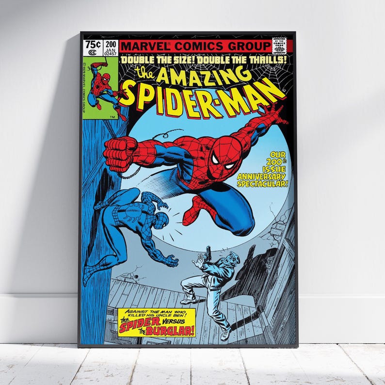 May include: A framed comic book cover of The Amazing Spider-Man. The cover features Spider-Man in a dynamic pose, with text that reads "DOUBLE THE SIZE! DOUBLE THE THRILLS!" and "SPIDER VERSUS THE BURGLAR!"
