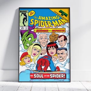 May include: A framed comic book cover of "The Amazing Spider-Man" featuring Spider-Man, the Green Goblin, and other characters. The cover has a blue background with the text "The Soul of the Spider!" and "Secret Wars continues in this issue!"