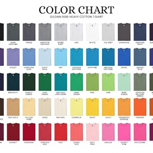 Color chart of Gildan 5000 Heavy Cotton T-shirts. The chart displays a variety of colors, including black, heather grey, white, blue, green, yellow, orange, pink, and purple. Each color is labeled with its name, providing a comprehensive guide for color selection.