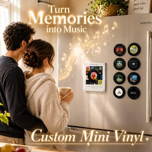 May include: A set of custom mini vinyl record magnets displayed on a stainless steel refrigerator. The collection includes eight circular magnets featuring various album cover art and a square acrylic frame containing a central vinyl record.