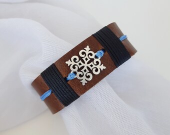 Pulsera de cuero con copo de nieve personalizada