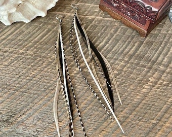 Feather earrings: long, thin pair in monochromatic colors. Wild elegance. Hand made and high quality. Choice of length.