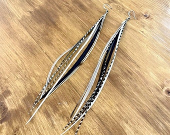 Feather earrings: long, thin pair in monochromatic colors. Wild elegance. Hand made and high quality. Choice of length.