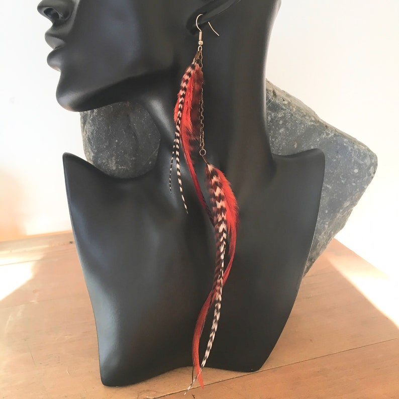 Single long cascading feather earring in burnt orange, rust, black and white stripes. Boho statement, hypoallergenic, handmade, unique. image 7