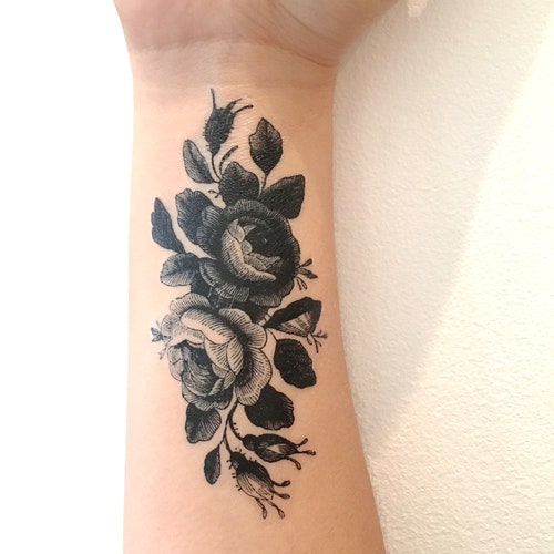 Delicate Flowers Blossom From Inky Black Backgrounds in Esther Garcias  Stylized Botanical Tattoos  Colossal