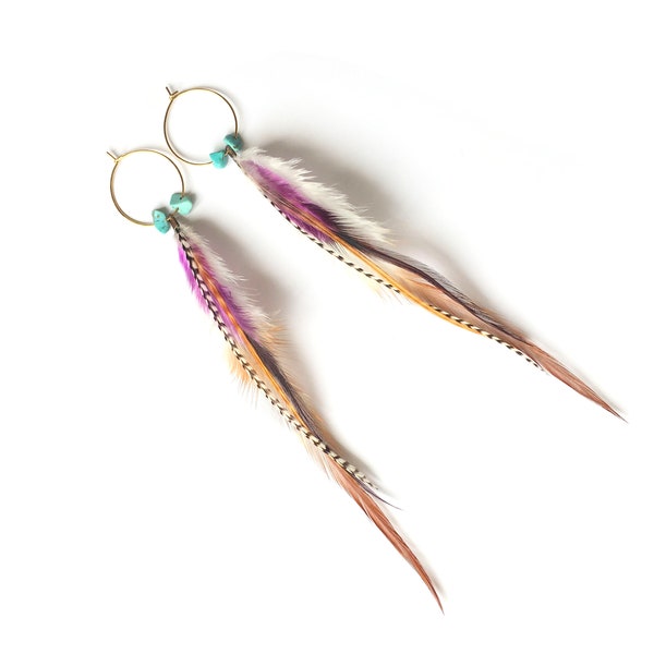 Feather earrings on gold hoop with turquoise stone detail. Boho earrings with pink, purple, orange yellow black and white long thin feathers