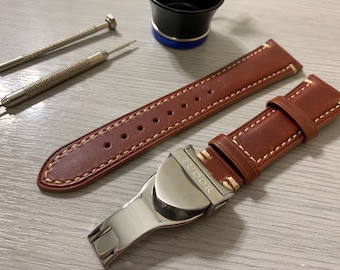Tudor 20 mm/22 mm bruin/rood herenpolshorlogeband met roestvrijstalen gespsluiting massief
