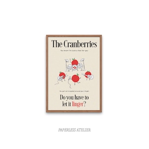 May include: A framed art print with the band name "The Cranberries" and lyrics "Do you have to let it linger?" in a whimsical design. The artwork features illustrations of red fruit playing musical instruments.