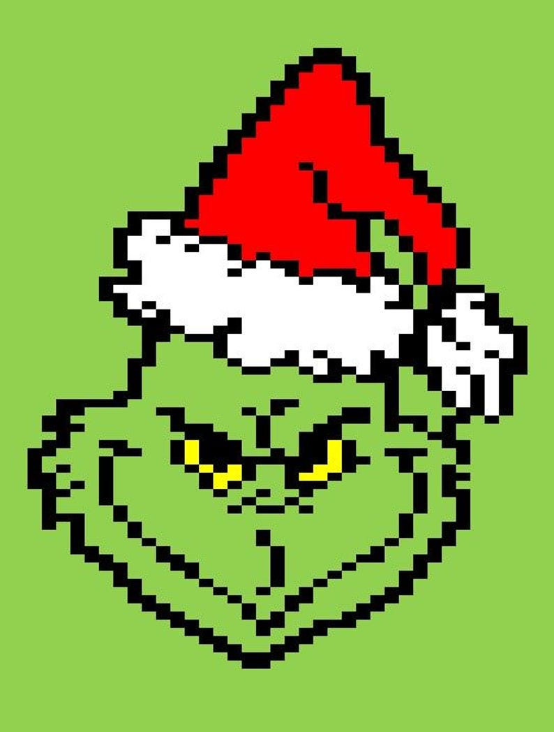 May include: Pixelated image of a green character wearing a red Santa hat with white trim. The character has yellow eyes and a mischievous expression, set against a light green background.