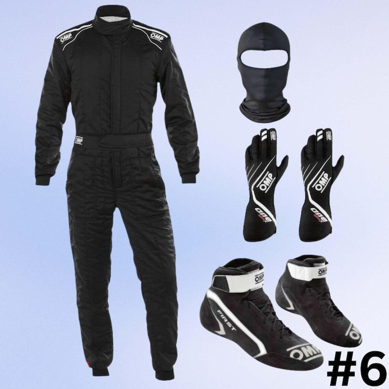 May include: A black racing suit, balaclava, gloves, and shoes are displayed. The suit has white accents and OMP branding. The gloves and shoes also feature OMP logos. The shoes are black with white details.