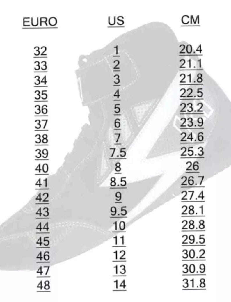 May include: Black and white high-top sneaker with a lightning bolt design. The image includes a size chart with US, Euro, and centimeter measurements. Sizes range from US size 1 (20.4 cm) to US size 14 (31.8 cm).