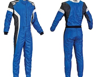 May include: A blue racing suit shown from the front and back, featuring black and white side panels, a high collar, and OMP branding on the shoulders and neck. The garment has long sleeves, full-length legs, and a structured, athletic design.