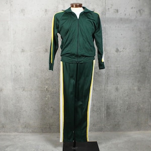 May include: A dark green track suit featuring a full-length front zipper on the jacket. The long-sleeved jacket and matching pants are accented with vertical yellow and white stripes running down the outer arms and along the sides of the legs.
