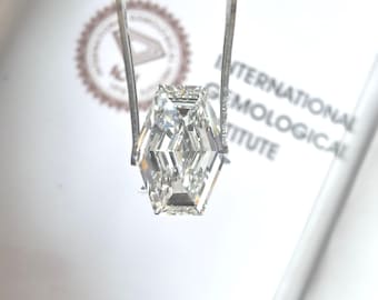 Diamante hexagonal de 3 quilates con talla escalonada, color f, claridad VVS2, certificado por IGI.
