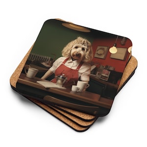 May include: A stack of four square coasters with a cork base. The top coaster features a dog dressed as a barista behind a counter. The dog is wearing a white shirt, red apron, and has a coffee shop setting in the background.