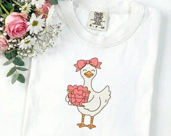Comfort Colors® Cute Love Goose T-Shirt | Goose with Heart Basket and Bow | Farm Animal Valentine Graphic Tee | Romantic Whimsical Gift
