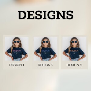 May include: A display of three dark blue t-shirts labeled DESIGN 1, DESIGN 2, and DESIGN 3. Each shirt features the text SIEBEN with a name underneath and a small heart outline. The shirts are worn by a person wearing heart-shaped sunglasses.