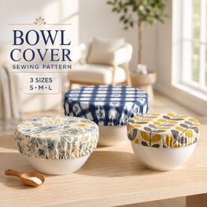 May include: Three white bowls with fabric covers in floral, blue tie-dye, and yellow leaf patterns. Text reads: BOWL COVER SEWING PATTERN 3 SIZES S M L. A small wooden scoop sits nearby. The covers are elasticized to fit snugly over the bowls.