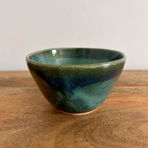 Beautiful handmade pottery bowl in ash green glaze