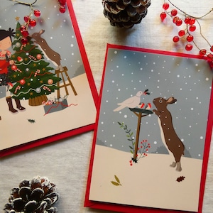 Lot de 2 cartes postales "Au pied du sapin de Noël"
