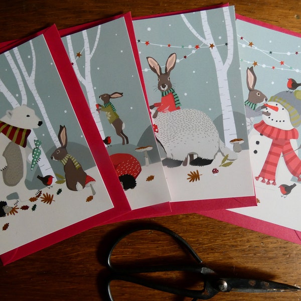 Lot de 4 cartes postales Noël en forêt.